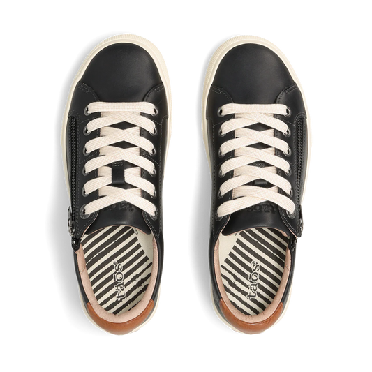 Black sneakers with white laces on a white background